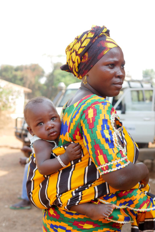 A woman and her child in Sengbe village in Northwestern Sierra Leone.