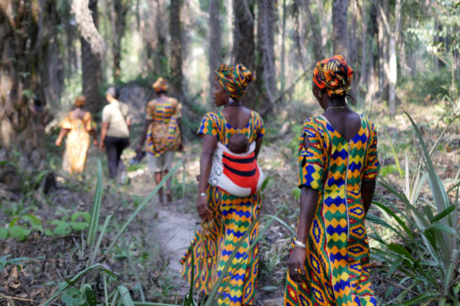 The women of Sengbe village in northwest Sierra Leone greeted us with these amazing outfits and took us trekking through the woods to see their rice fields.